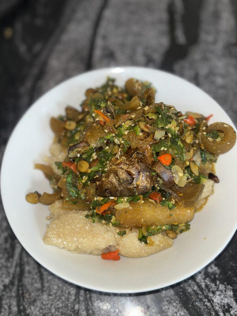 Trying to eat lighter or cooking on a budget?Learn how to make a delicious, satisfying oil-less okro soup with chicken stock,ponmo, dried fish,and scent leaves.